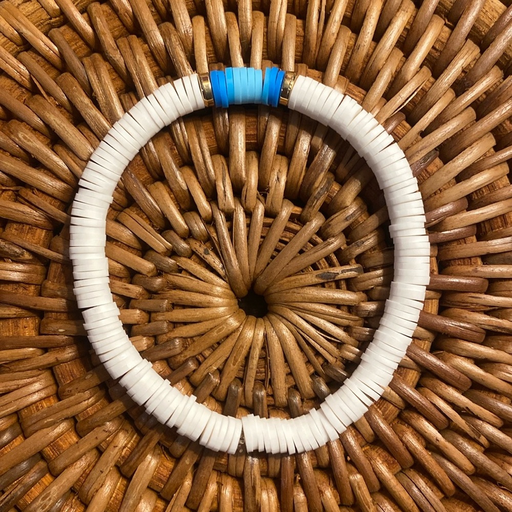 A handmade clay bead bracelet